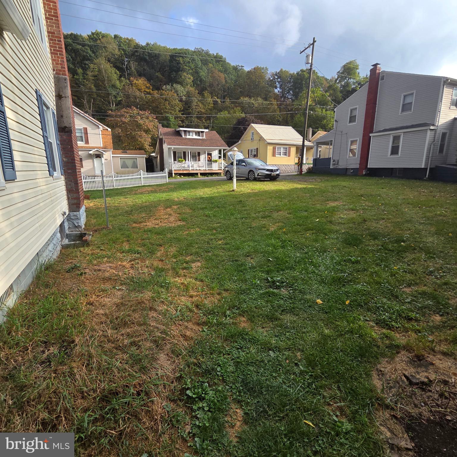 15919 Foundry Row Northwest Mount Savage, MD 21545 - Photo 27 of 41 a view of a house with a big yard and large trees