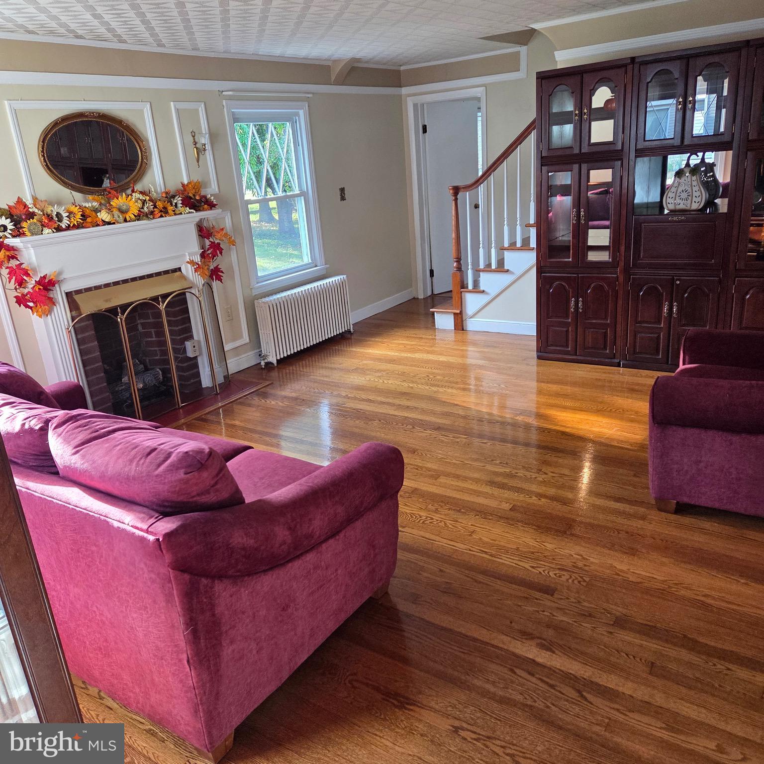 15919 Foundry Row Northwest Mount Savage, MD 21545 - Photo 6 of 41 a living room with furniture and a fireplace