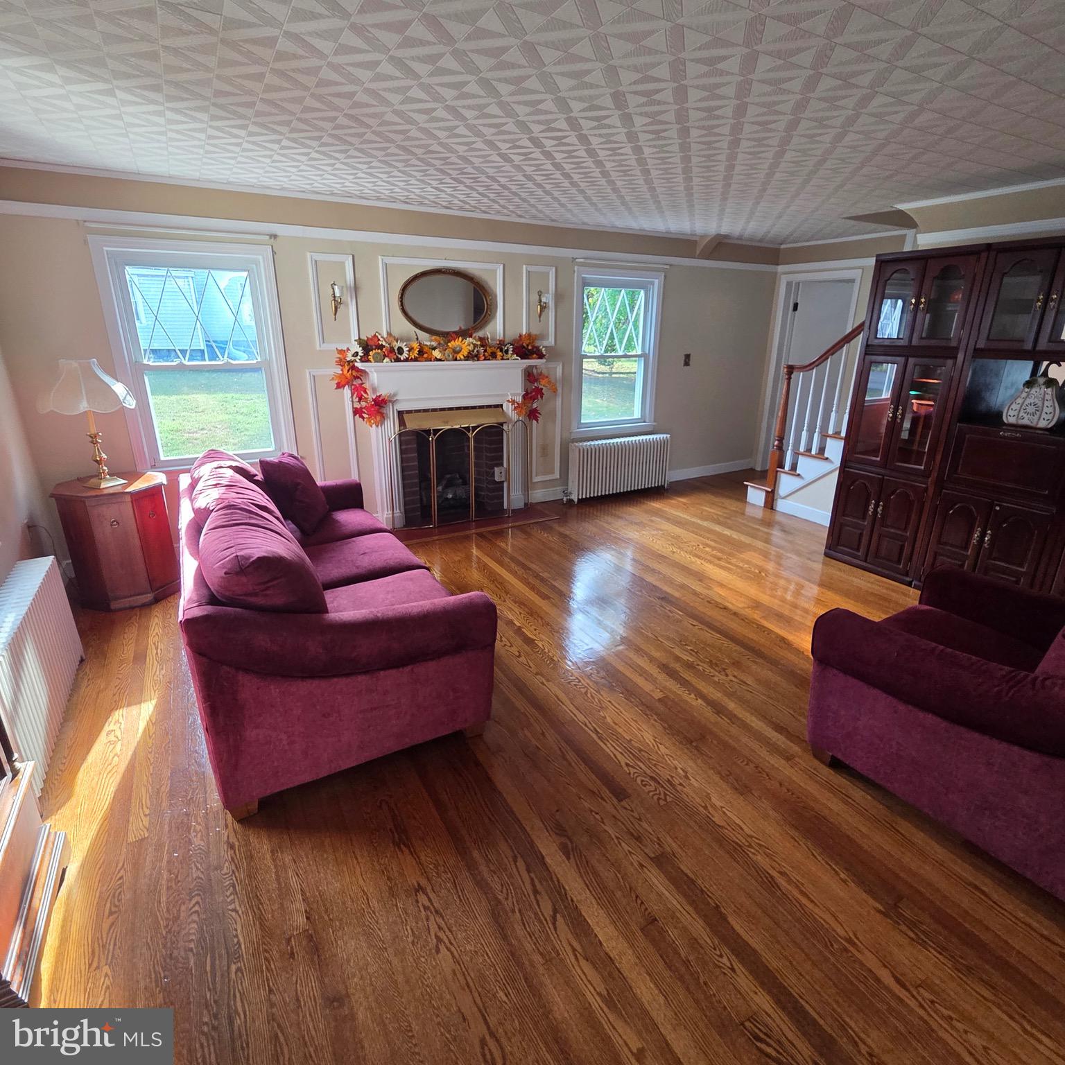 15919 Foundry Row Northwest Mount Savage, MD 21545 - Photo 8 of 41 a living room with furniture fireplace and a window