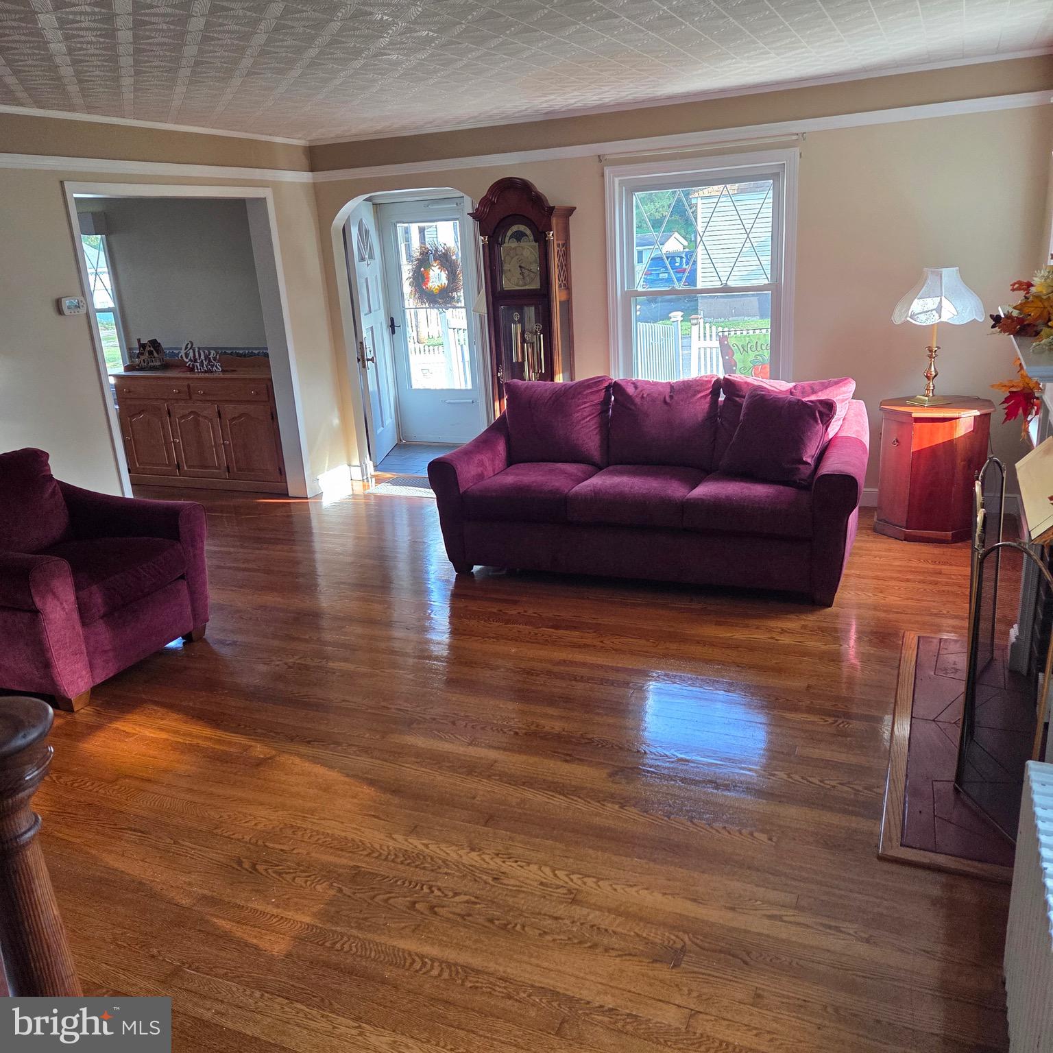 15919 Foundry Row Northwest Mount Savage, MD 21545 - Photo 9 of 41 a living room with furniture and a fireplace