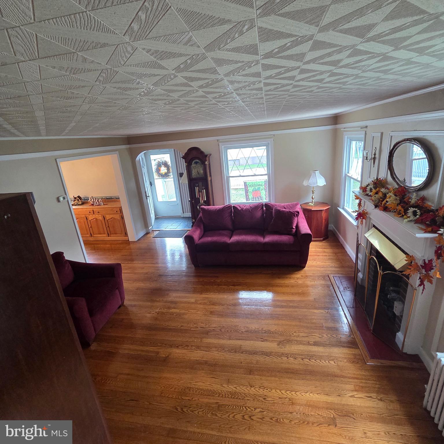 15919 Foundry Row Northwest Mount Savage, MD 21545 - Photo 10 of 41 a living room with furniture and a fireplace