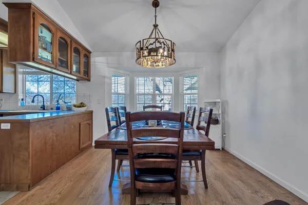 a kitchen with stainless steel appliances granite countertop a sink and cabinets