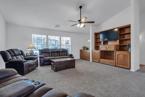 a living room with furniture and window
