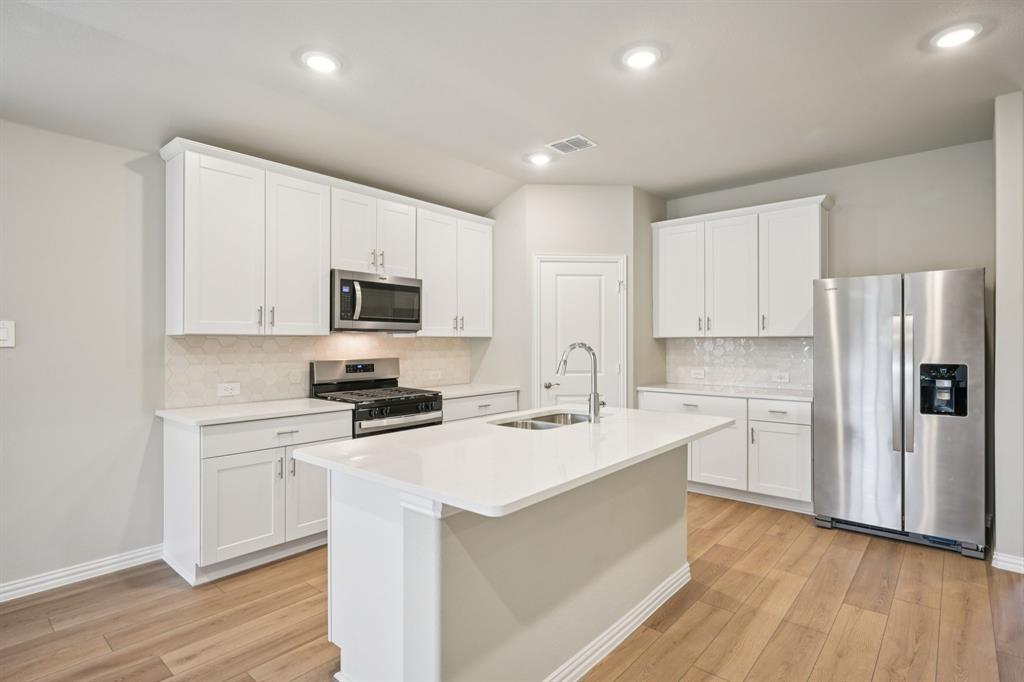 2105 Rannoch Street Sherman, TX 75092 - Photo 1 of 26 Photo is not of the actual home, but is an inspirational photo of builder’s model home and may depict options, furnishings, and/or decorator features that are not included.