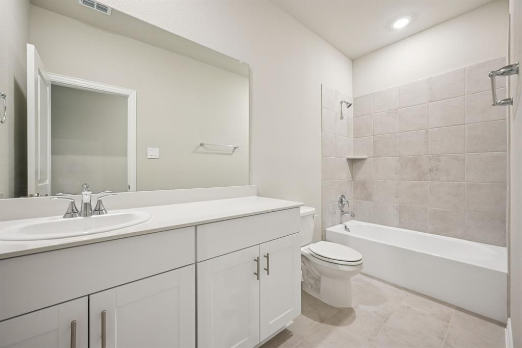 2105 Rannoch Street Sherman, TX 75092 - Photo 18 of 26 Photo is not of the actual home, but is an inspirational photo of builder’s model home and may depict options, furnishings, and/or decorator features that are not included.