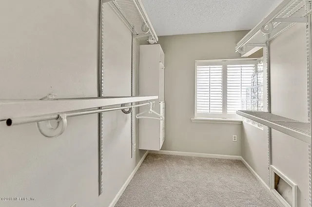 a view of a walk in closet