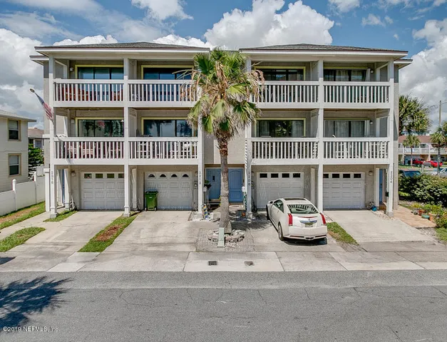 a car parked in front of a building