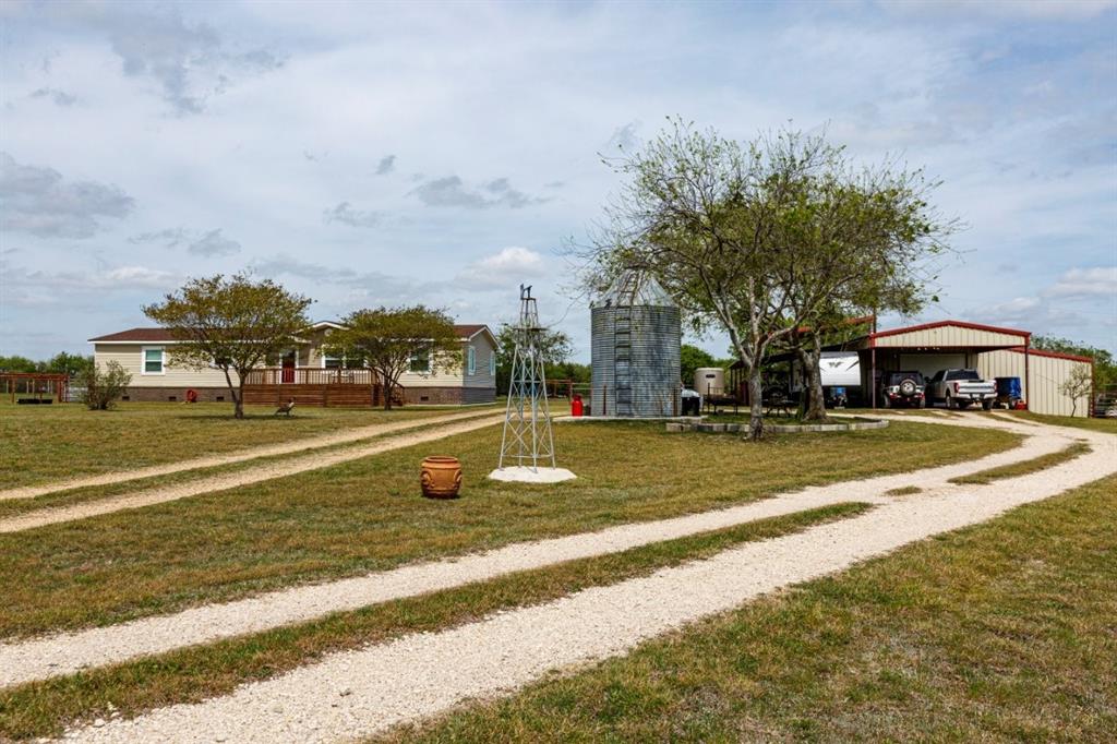 4880 Whitehead Road Midlothian, TX 76065 - Photo 1 of 36 a view of street with houses with trees