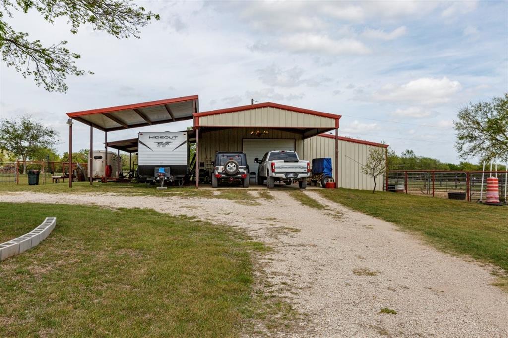 4880 Whitehead Road Midlothian, TX 76065 - Photo 29 of 36 a view of a street with cars