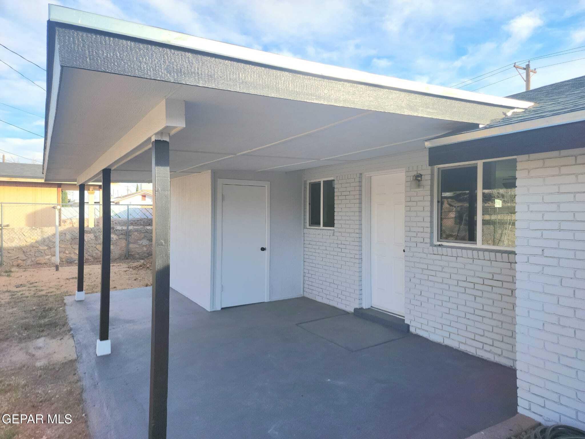 5845 Threadgill Avenue El Paso, TX 79924 - Photo 46 of 50 a view of an empty room with glass door