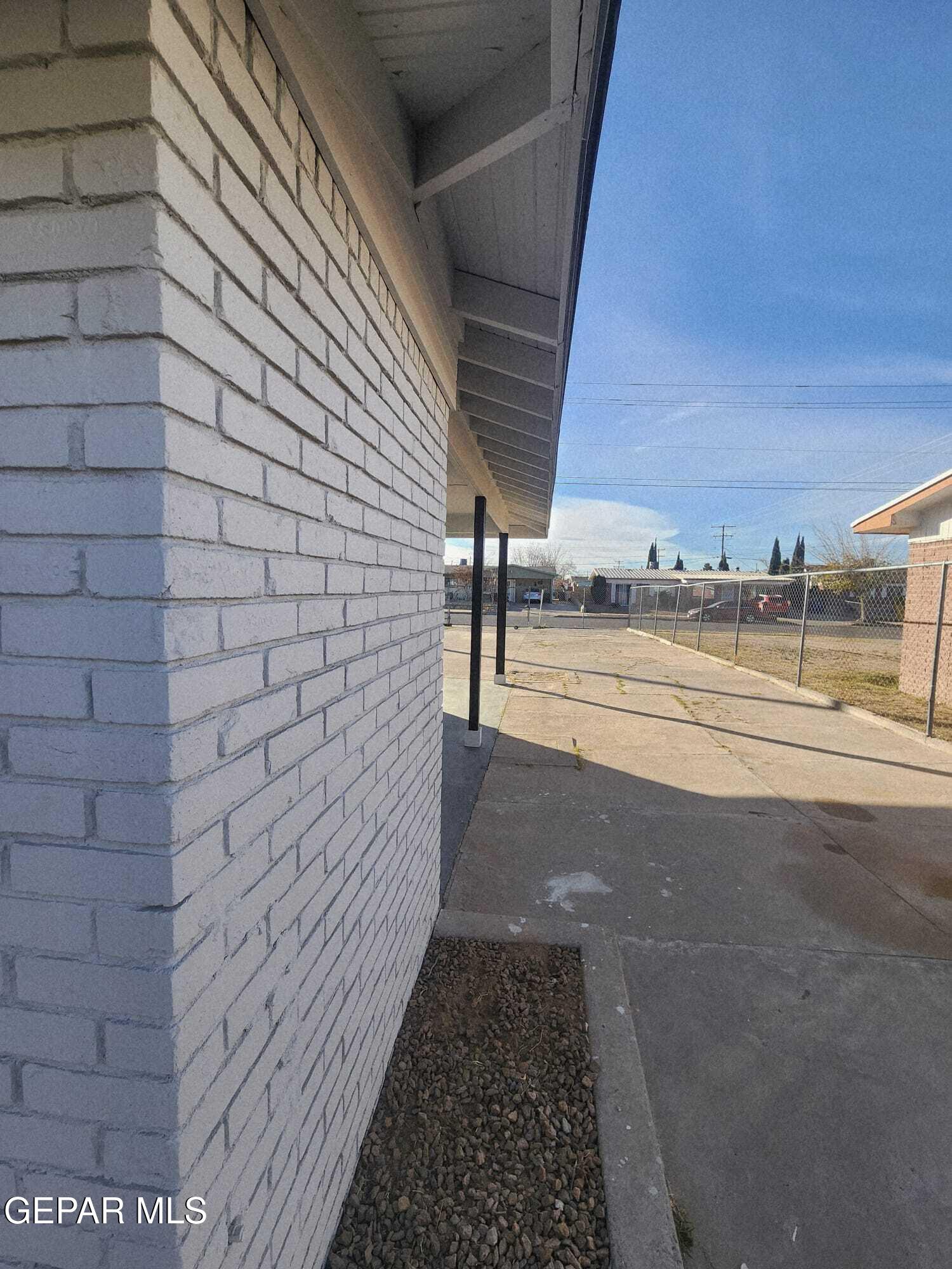 5845 Threadgill Avenue El Paso, TX 79924 - Photo 48 of 50 a view of a pathway both side of building