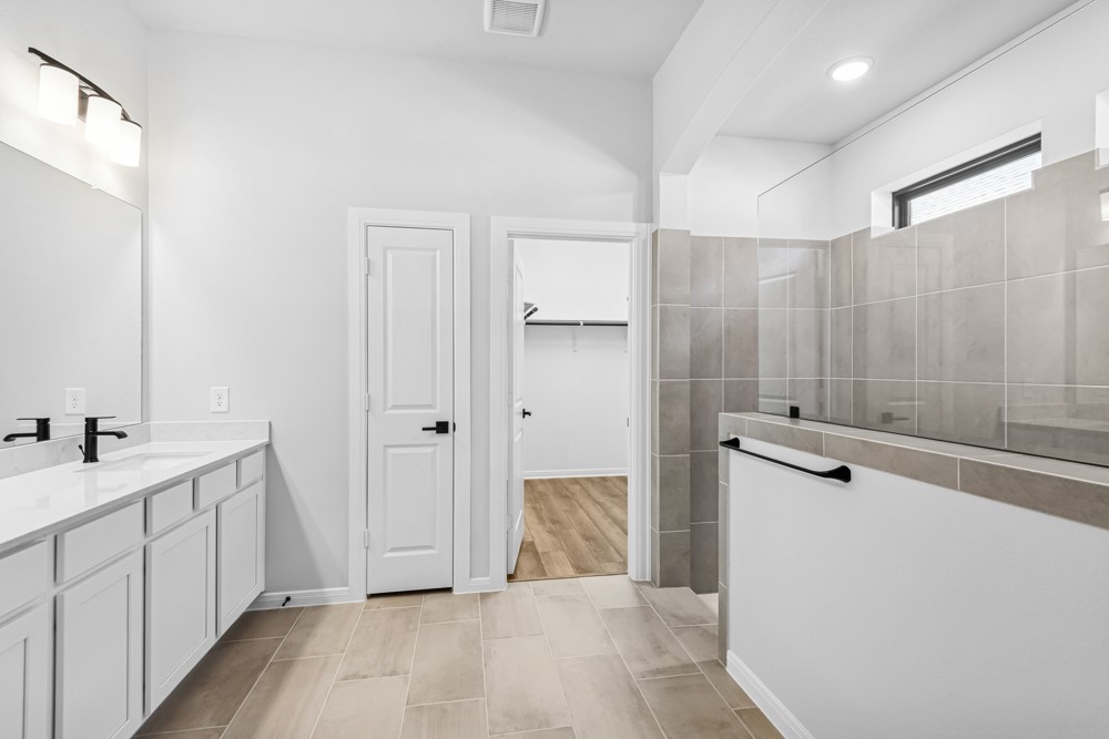 888 Prominence Way Leander, TX 78641 - Photo 10 of 19 Gladesdale - Owner's Shower - Salt Flat Inspirations