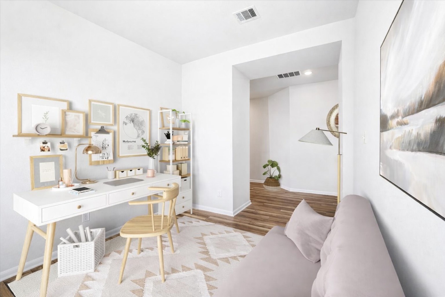 a living room with furniture and a table