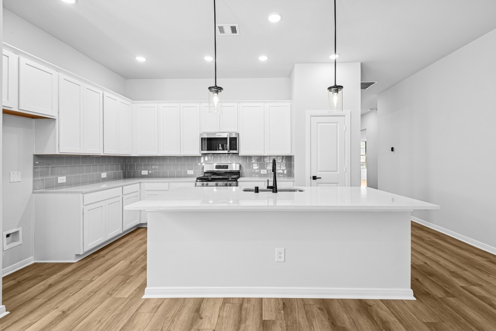 888 Prominence Way Leander, TX 78641 - Photo 4 of 19 Gladesdale Kitchen with Salt Flat Inspirations