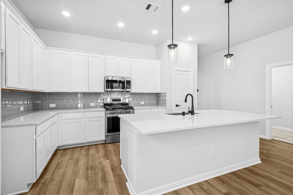 888 Prominence Way Leander, TX 78641 - Photo 5 of 19 Gladesdale Kitchen with Salt Flat Inspirations