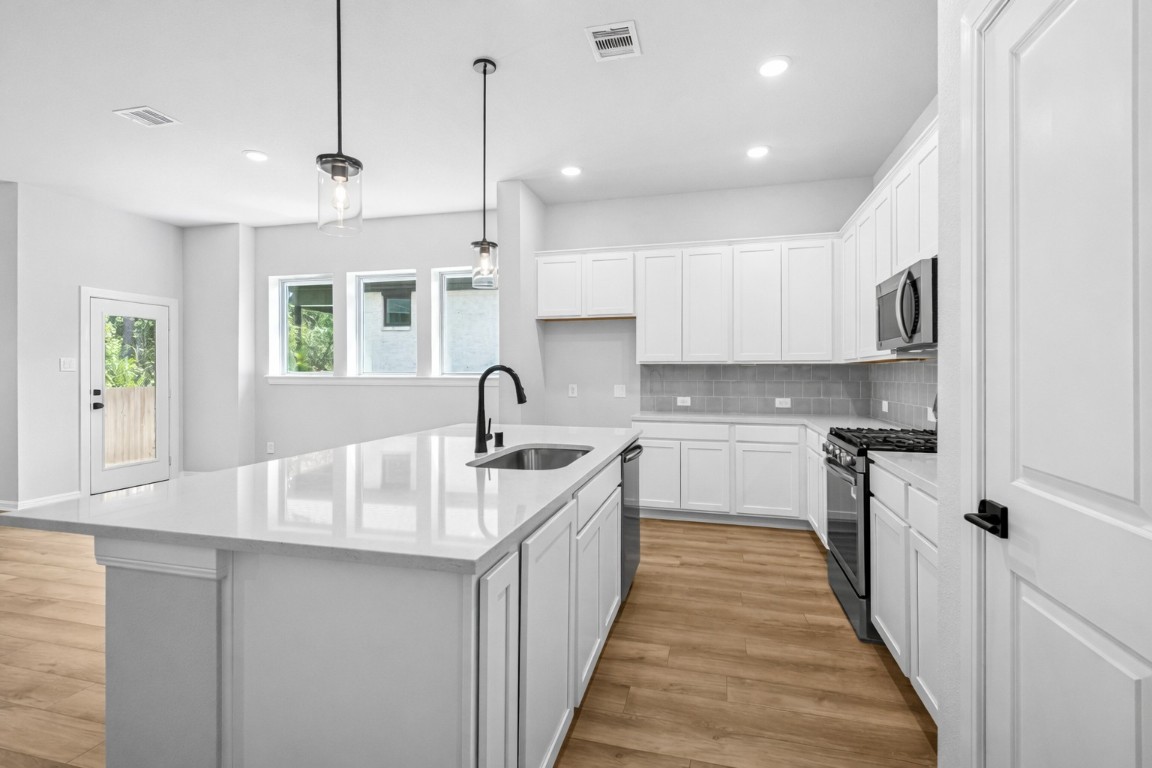 888 Prominence Way Leander, TX 78641 - Photo 6 of 19 Gladesdale Kitchen with Salt Flat Inspirations