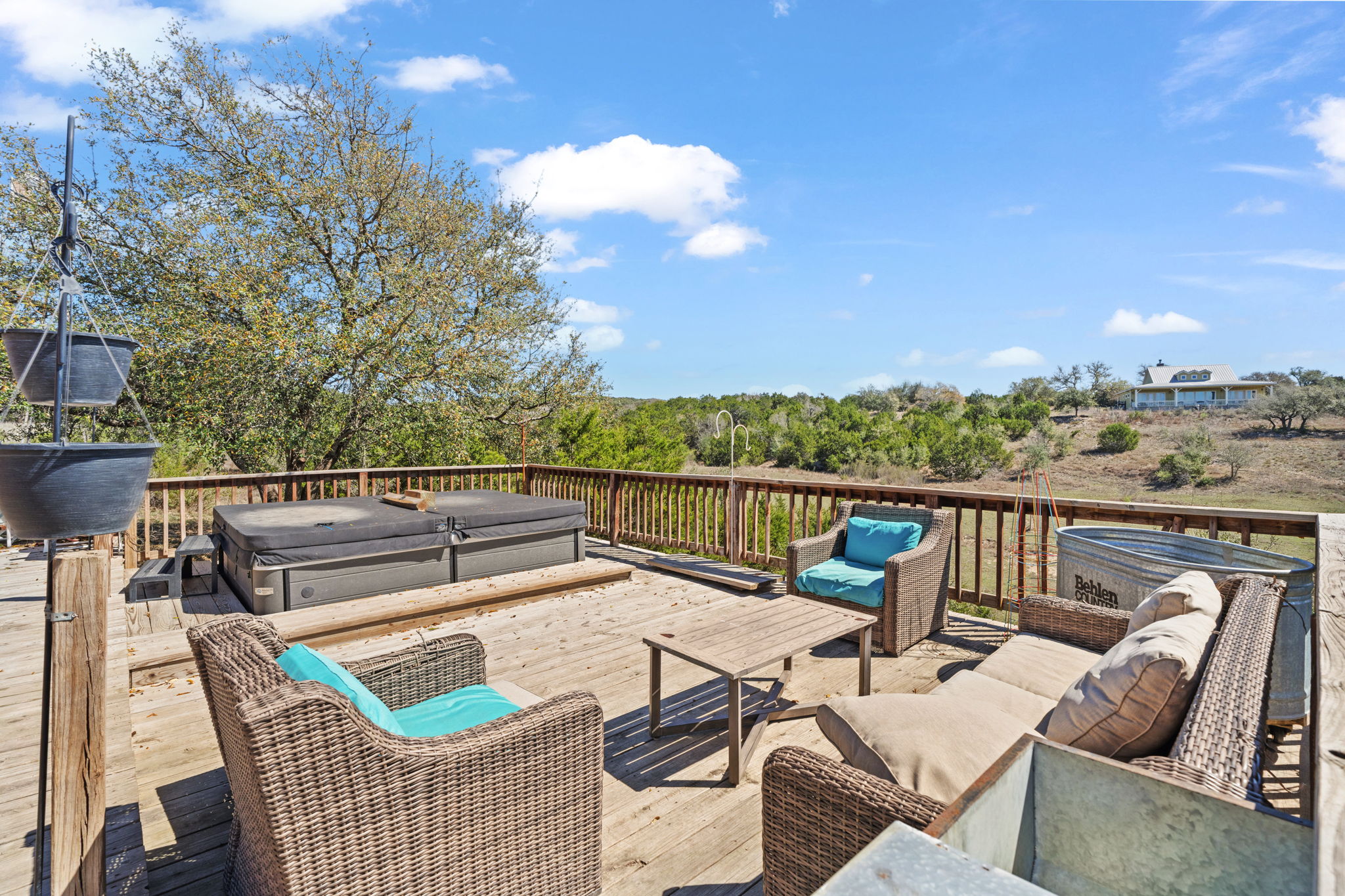 6350 Mt Sharp Road, Unit B Wimberley, TX 78676 - Photo 26 of 34 a view of a patio with couches chairs
