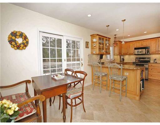 2 Wilson Ridge Road Darien, CT 06820 - Photo 12 of 20 a dining room with furniture a chandelier and kitchen view