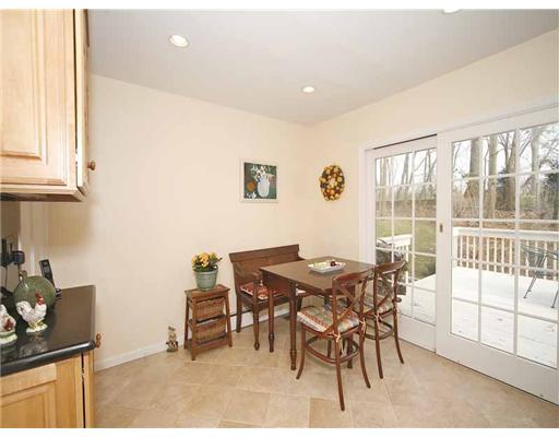 2 Wilson Ridge Road Darien, CT 06820 - Photo 13 of 20 a view of a dining room with furniture and a window