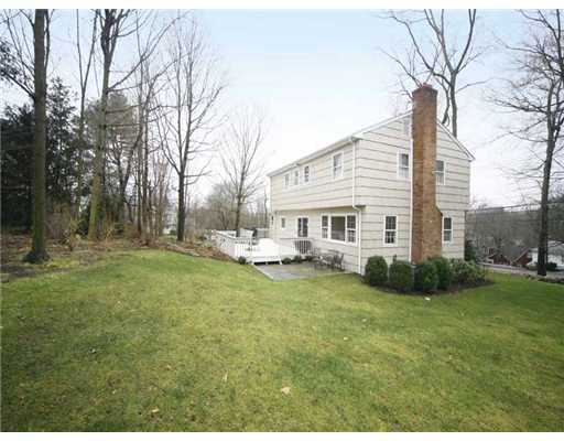 2 Wilson Ridge Road Darien, CT 06820 - Photo 20 of 20 a view of a house with backyard and sitting area