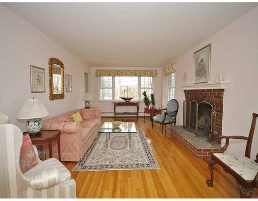 2 Wilson Ridge Road Darien, CT 06820 - Photo 5 of 20 a living room with furniture and a fireplace