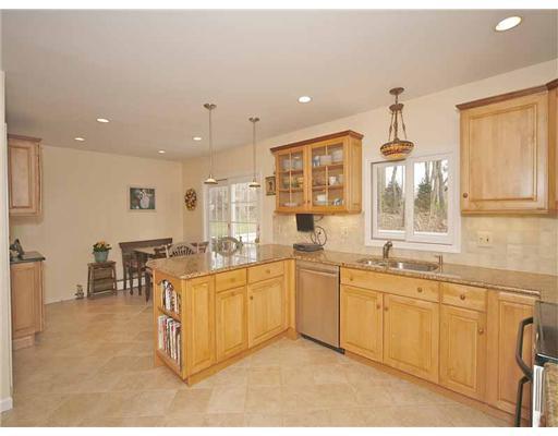 2 Wilson Ridge Road Darien, CT 06820 - Photo 9 of 20 a large kitchen with lots of counter space and sink