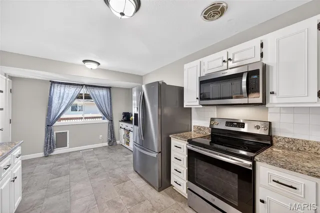 $335,000 | 893 Napoli Drive, Ballwin, MO 63021