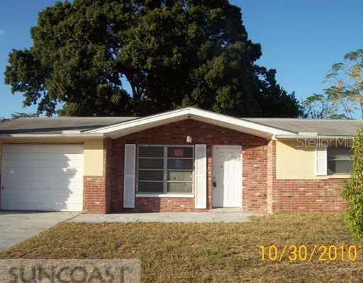 7715 Ilex Drive Port Richey, FL 34668 - Photo 1 of 1 Exterior Front