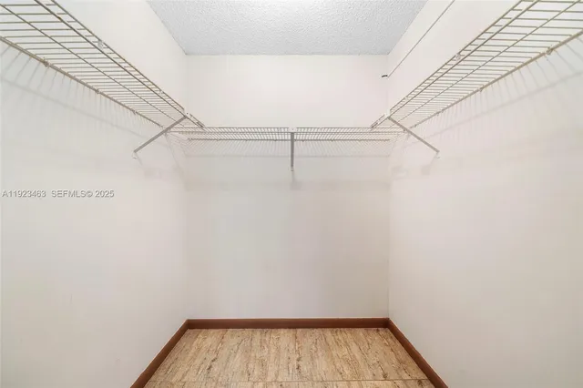 a view of a house with a yard and plants