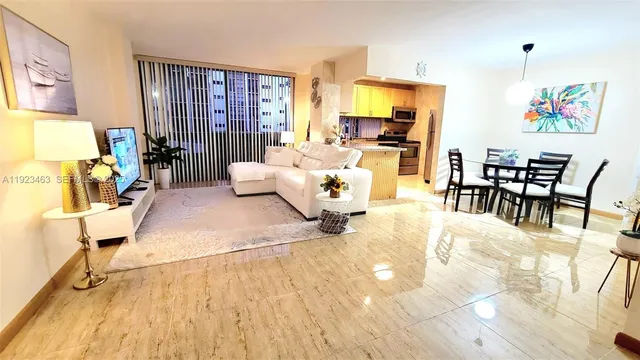 a living room with furniture and a table