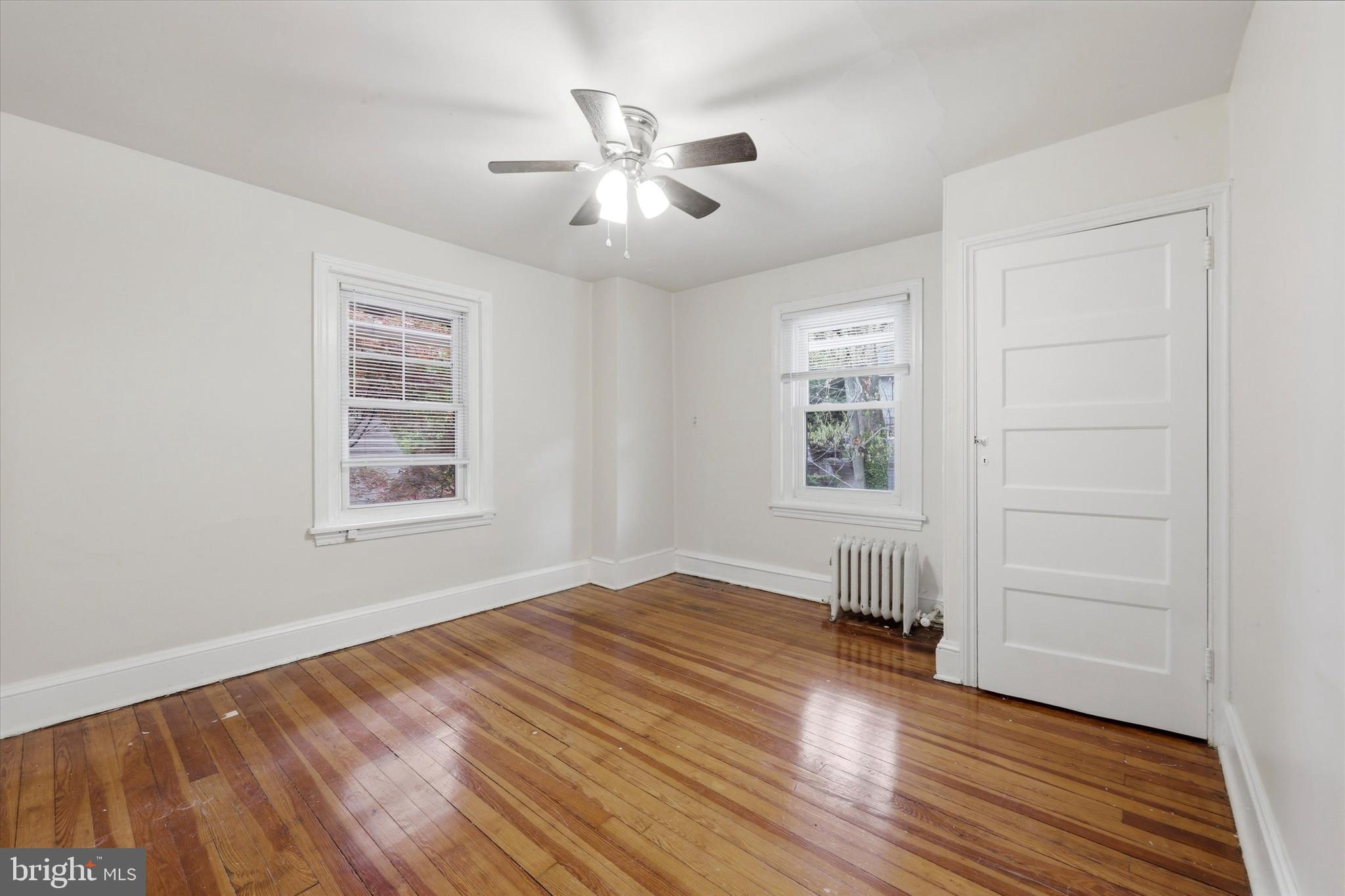 2044 North 63rd Street Philadelphia, PA 19151 - Photo 20 of 26 a view of empty room with wooden floor and fan
