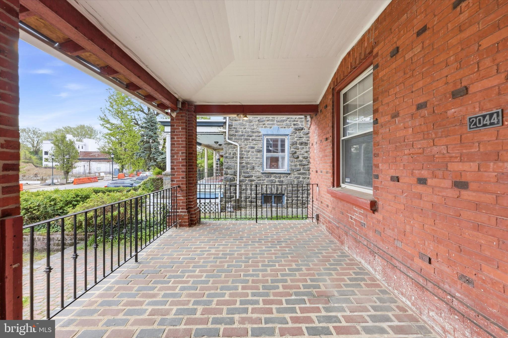 2044 North 63rd Street Philadelphia, PA 19151 - Photo 3 of 26 a view of a porch with wooden floor and furniture