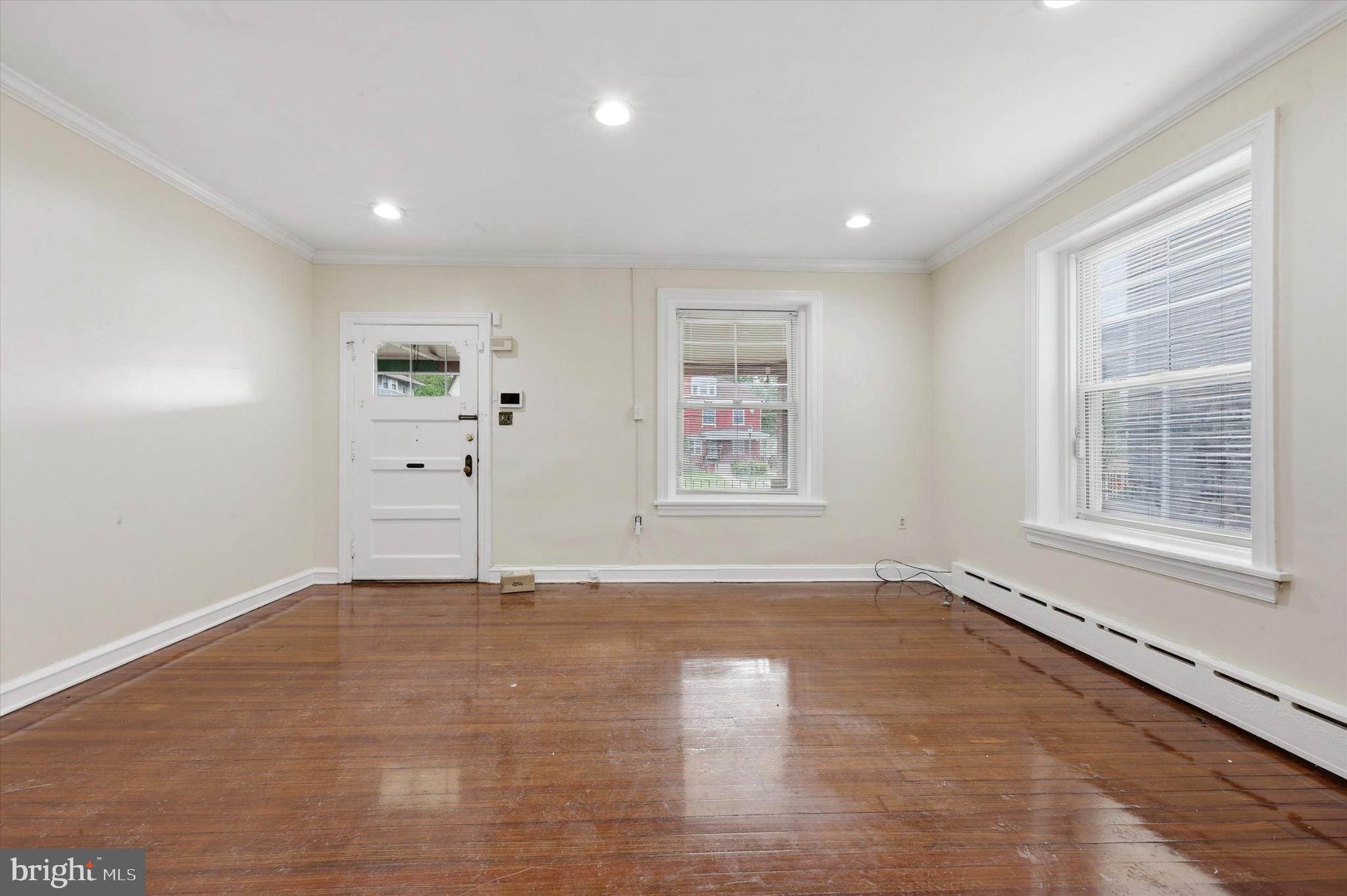 2044 North 63rd Street Philadelphia, PA 19151 - Photo 6 of 26 a view of an empty room with a window