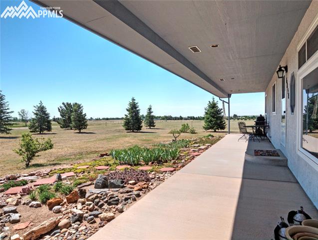 6890 Rio Road Peyton, CO 80831 - Photo 2 of 26 Wonderful covered front porch