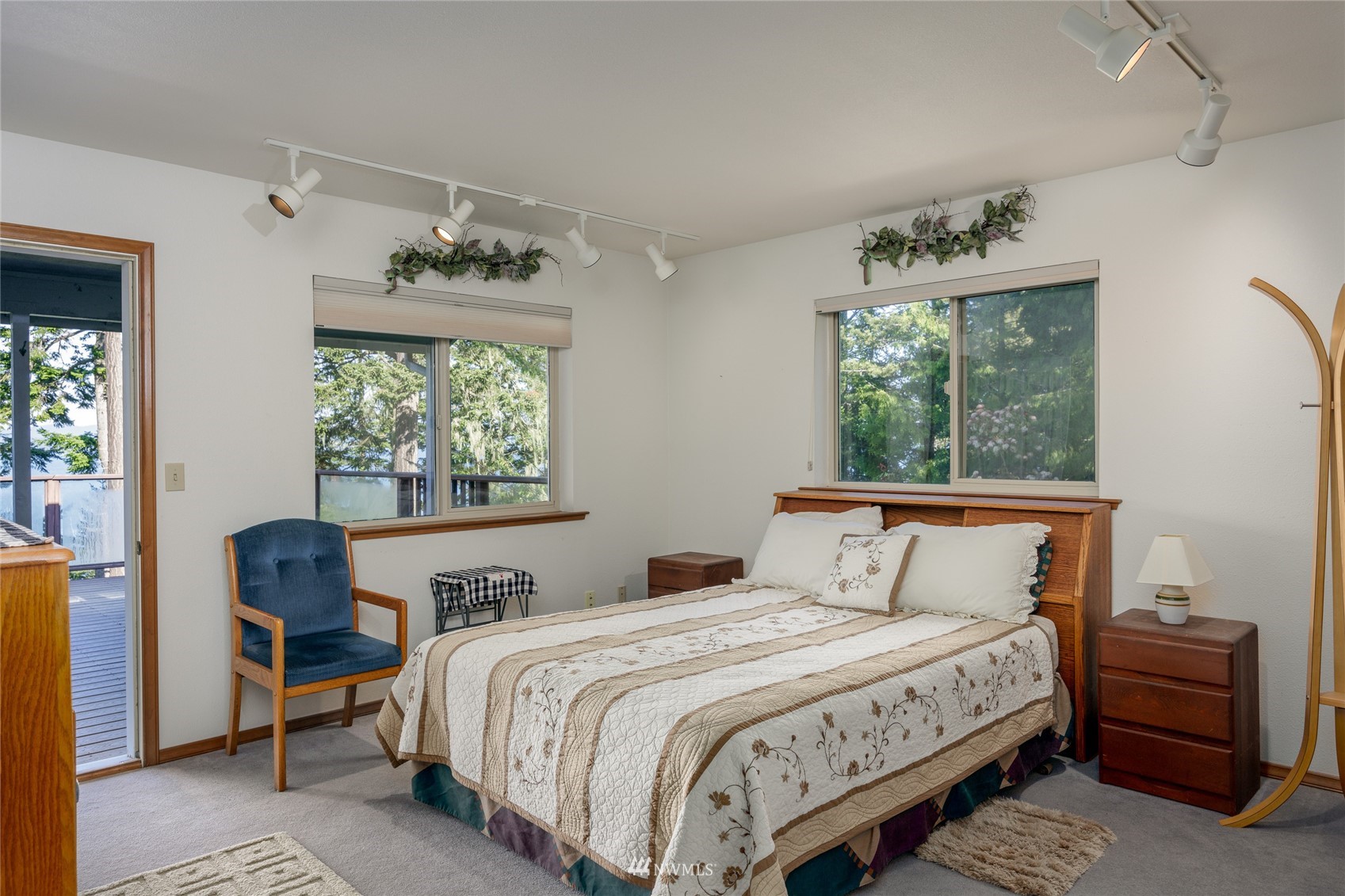 1384 Channel Road Lopez Island, WA 98261 - Photo 12 of 40 a bedroom with a bed and a window