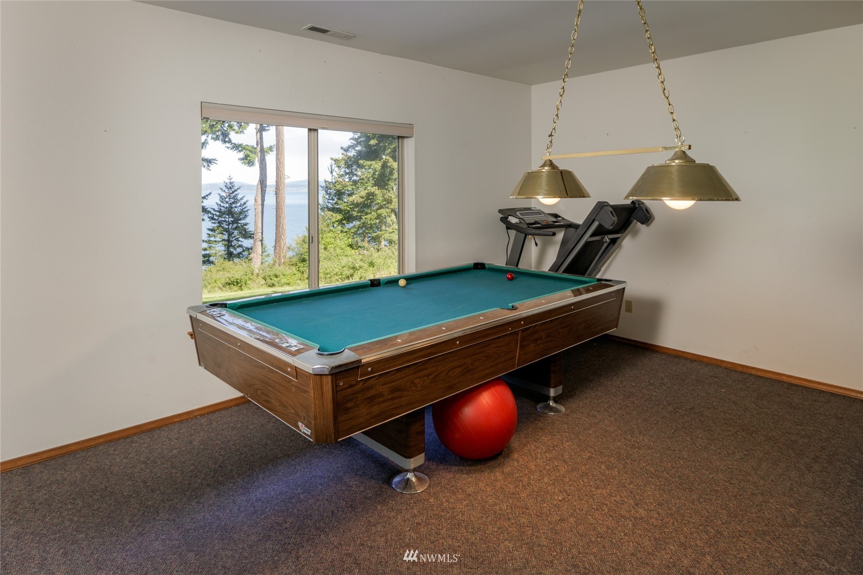 1384 Channel Road Lopez Island, WA 98261 - Photo 18 of 40 a room with pool table and windows