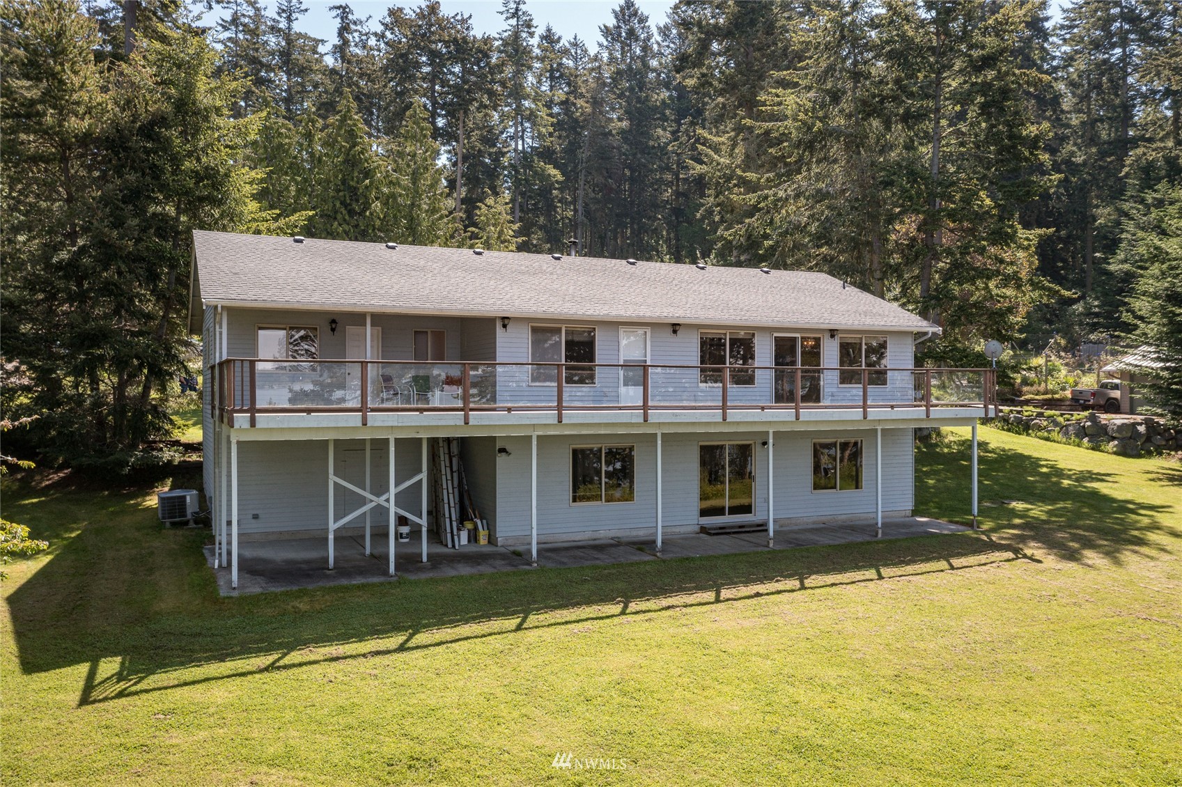 1384 Channel Road Lopez Island, WA 98261 - Photo 27 of 40 a view of a large building with a large pool