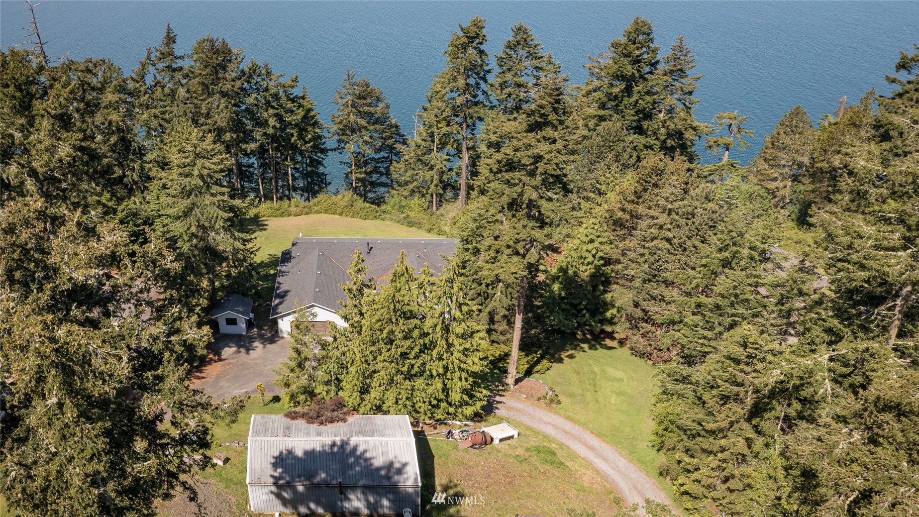 1384 Channel Road Lopez Island, WA 98261 - Photo 33 of 40 view of a yard with plants and large trees