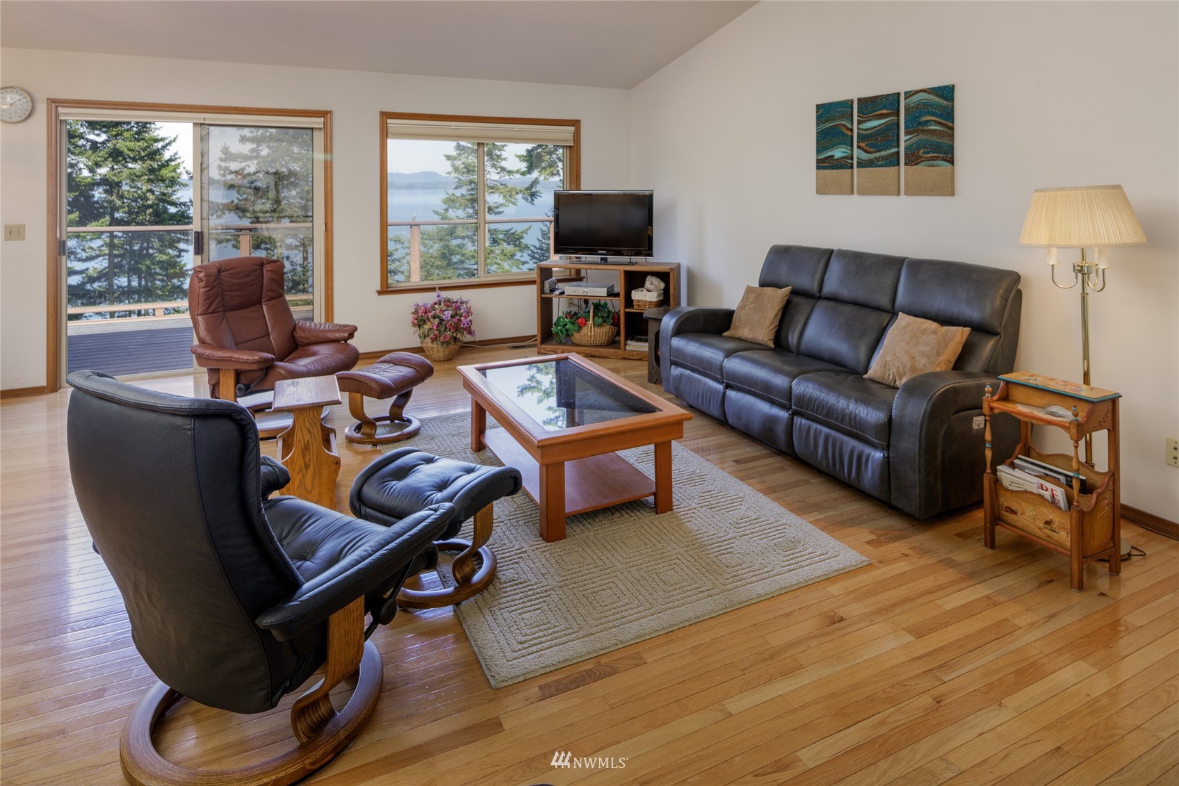 1384 Channel Road Lopez Island, WA 98261 - Photo 5 of 40 a living room with furniture and a flat screen tv