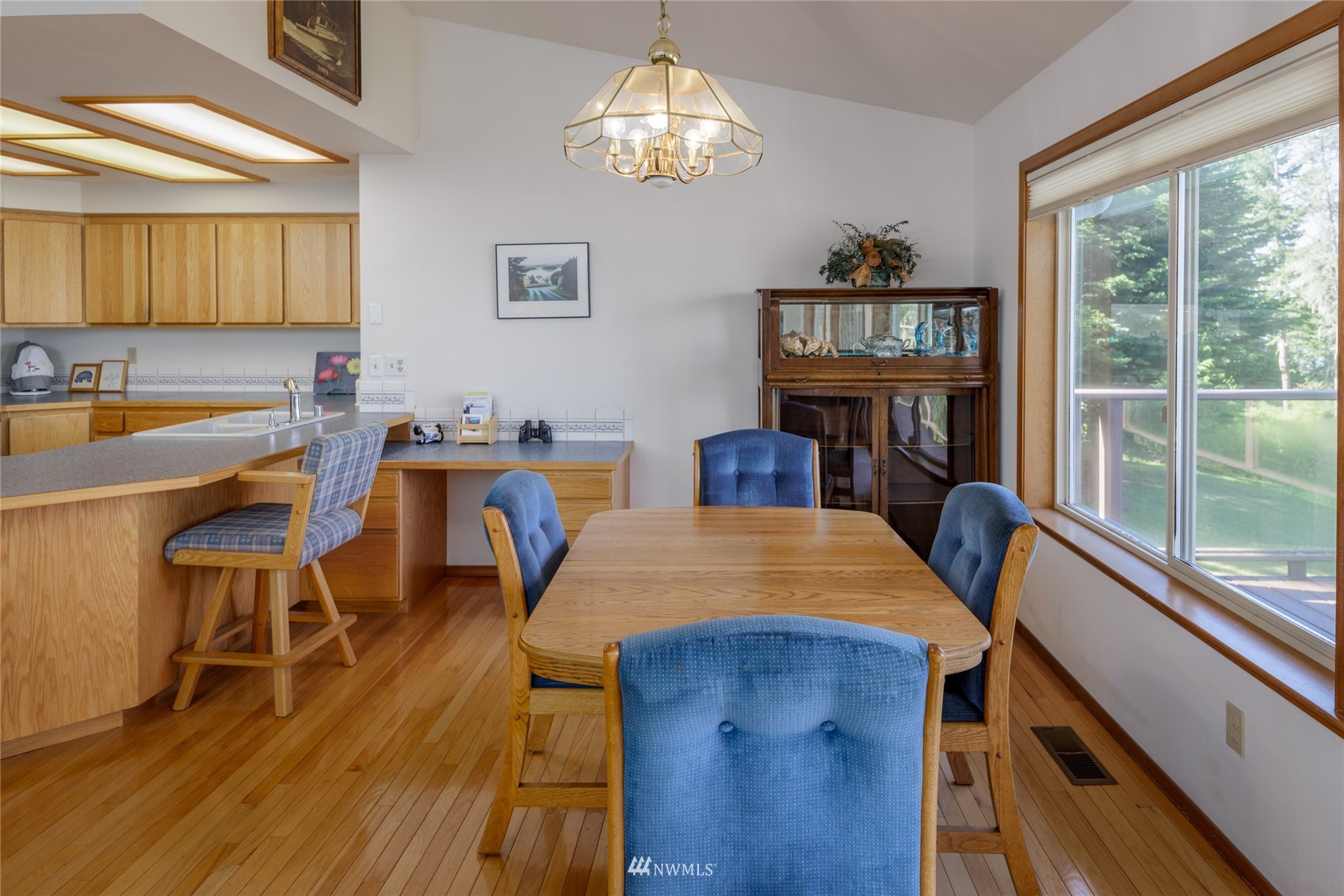 1384 Channel Road Lopez Island, WA 98261 - Photo 6 of 40 a view of a dining room with furniture window and outside view