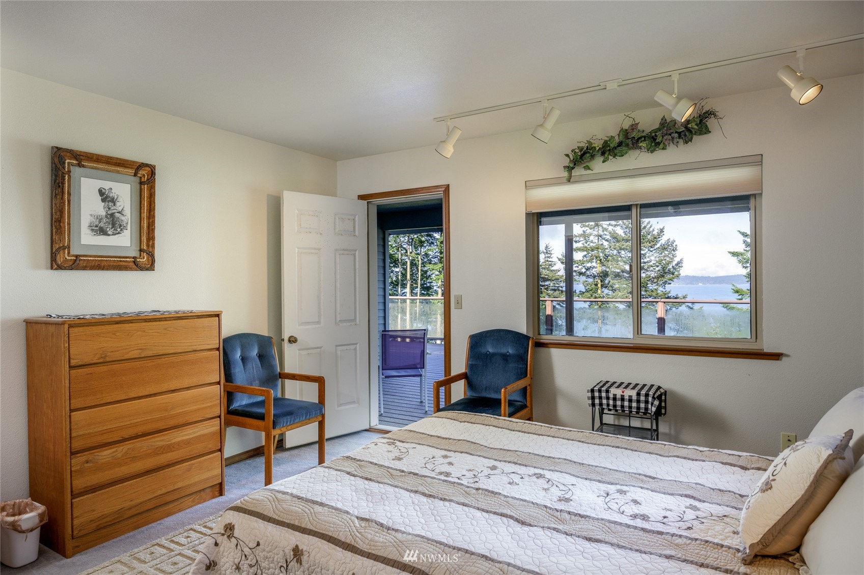 1384 Channel Road Lopez Island, WA 98261 - Photo 10 of 40 a bedroom with a bed and a window