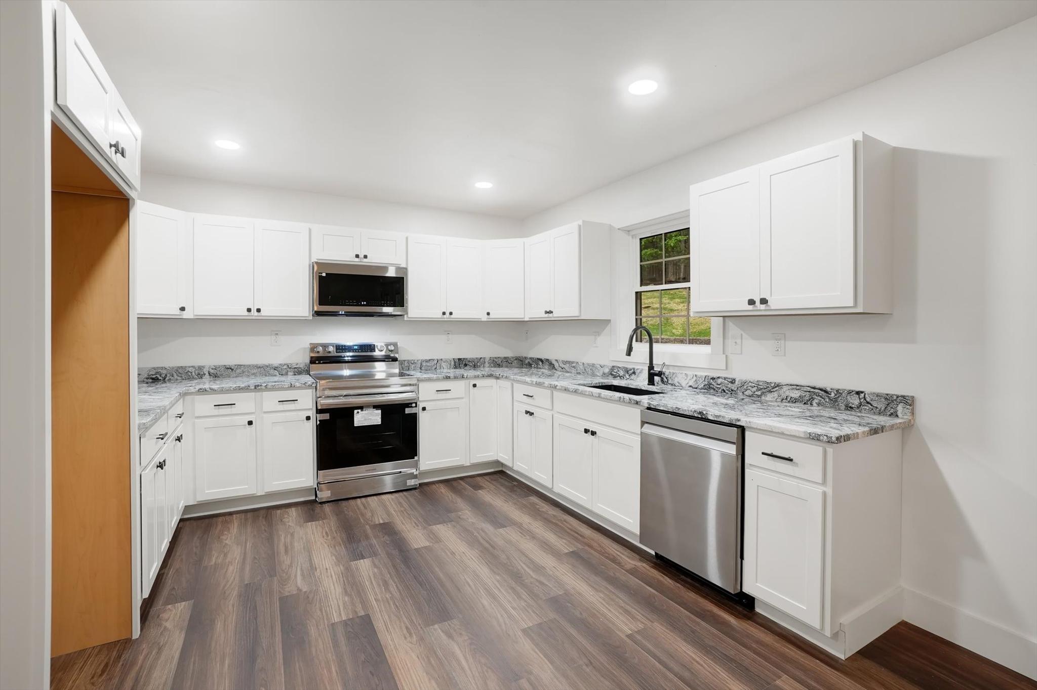 18985 Hebel Road Stewartstown, PA 17363 - Photo 15 of 42 Modern kitchen with sleek finishes.
