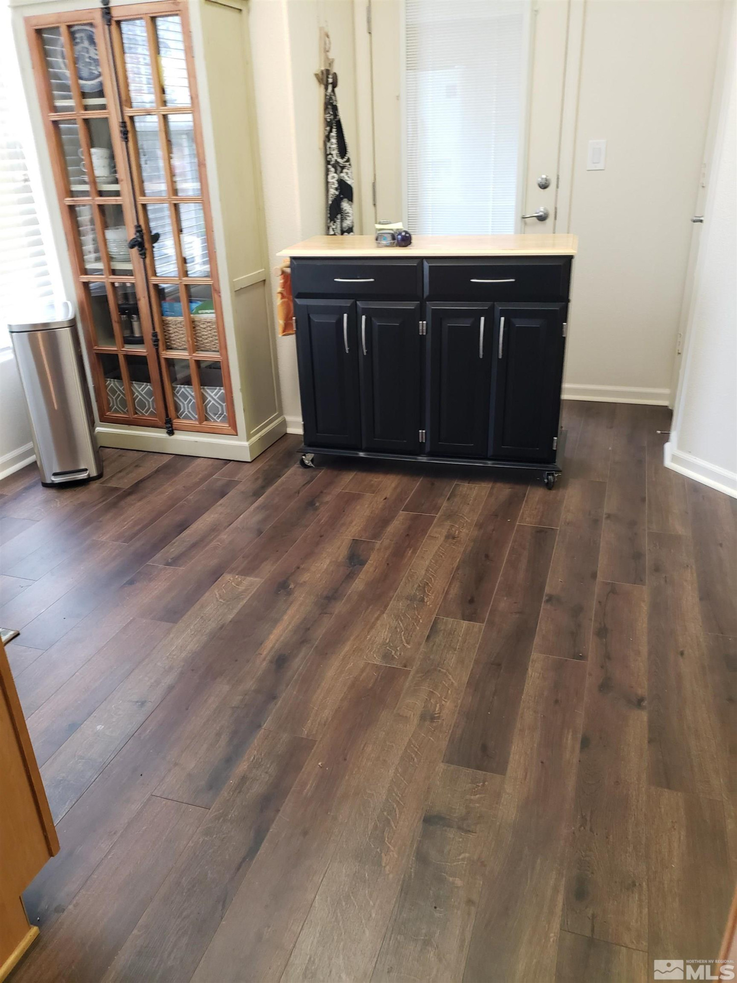 1325 South Meadows Parkway, Unit 311 Reno, NV 89521 - Photo 11 of 37 a room with a cabinets and a sink