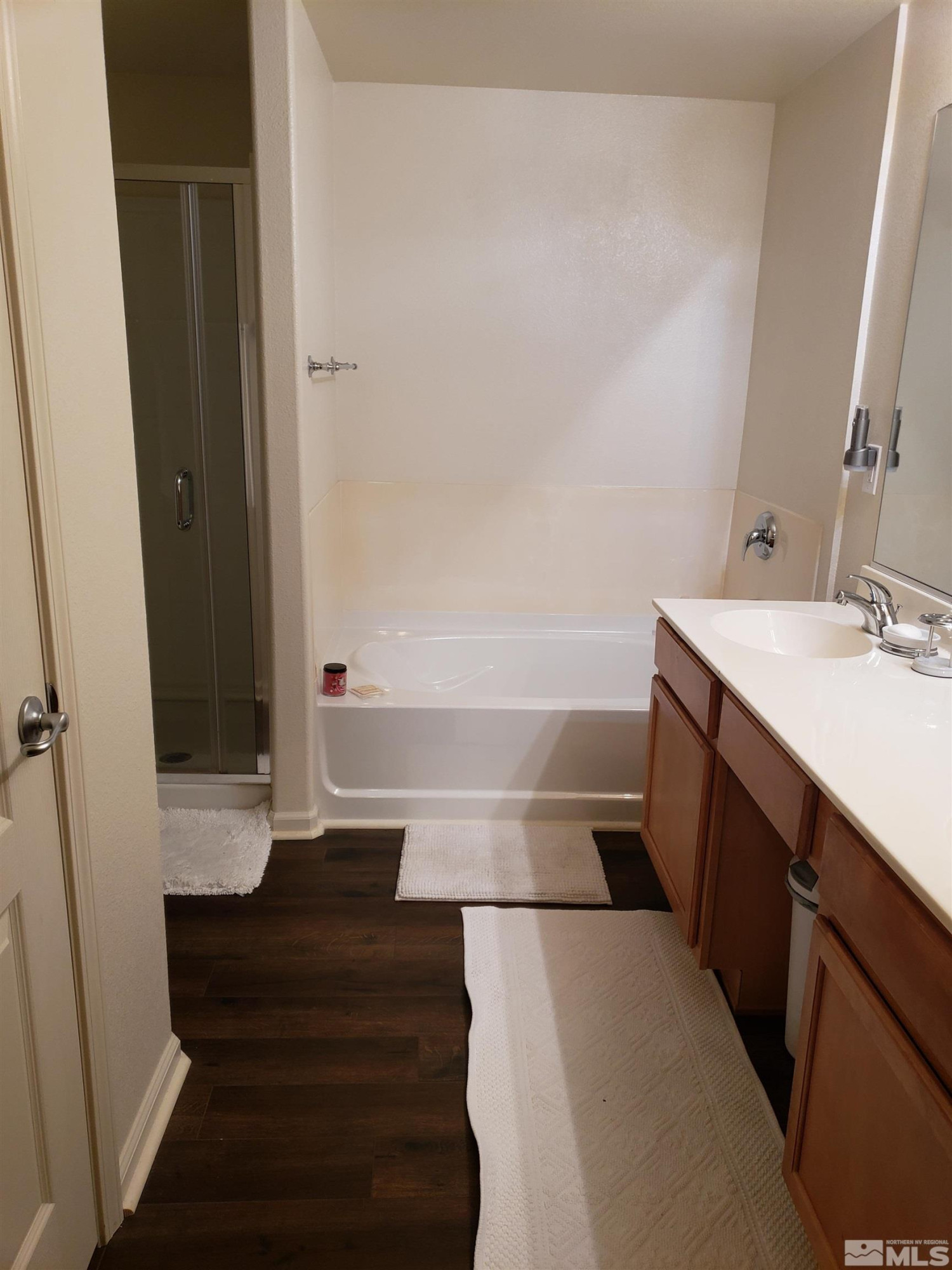 1325 South Meadows Parkway, Unit 311 Reno, NV 89521 - Photo 18 of 37 a bathroom with a sink and a mirror