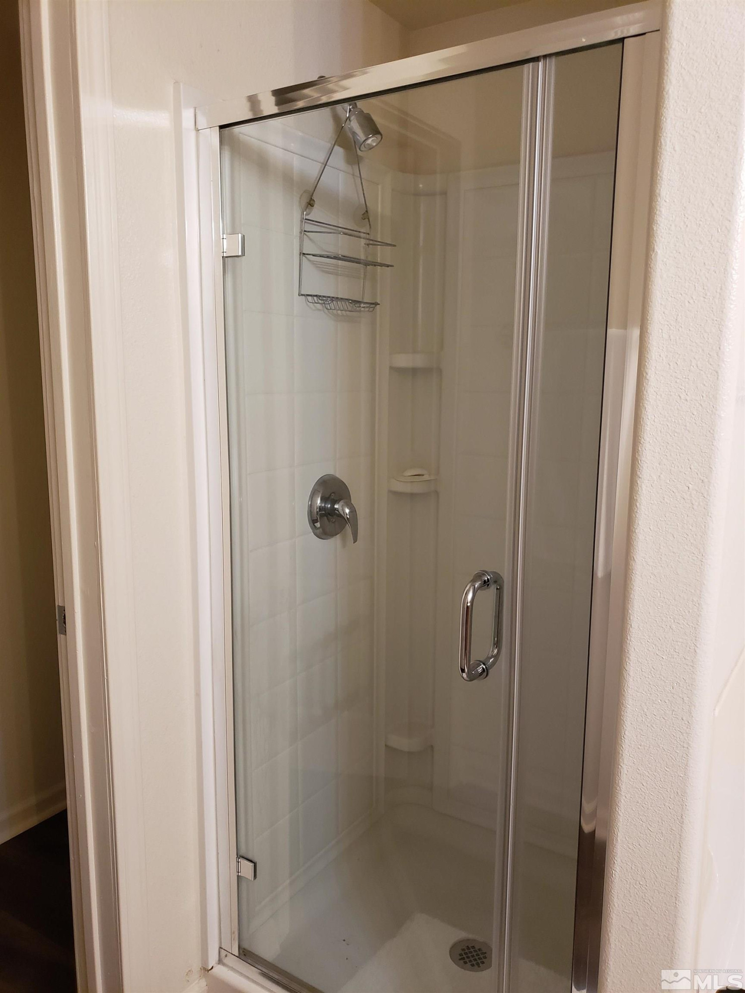 1325 South Meadows Parkway, Unit 311 Reno, NV 89521 - Photo 30 of 37 a bathroom with a shower