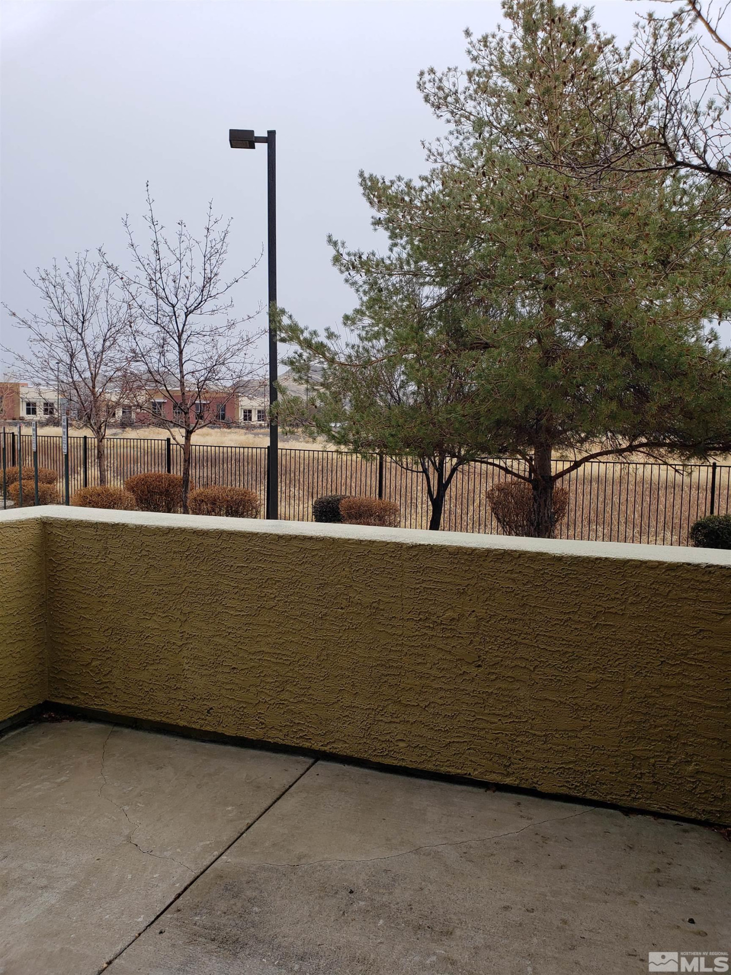 1325 South Meadows Parkway, Unit 311 Reno, NV 89521 - Photo 37 of 37 a view of swimming pool with outdoor seating