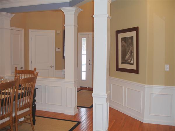 a view of a hallway with seating area