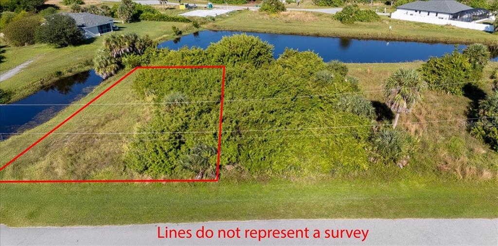 a view of swimming pool with a yard