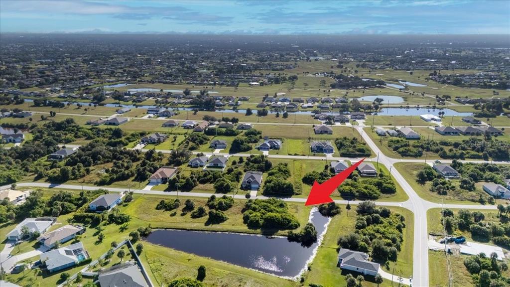 155 Spring Drive Rotonda West, FL 33947 - Photo 12 of 12 an aerial view of multiple house