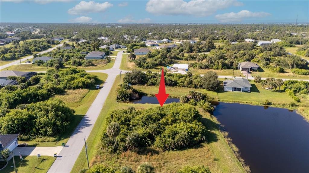 155 Spring Drive Rotonda West, FL 33947 - Photo 8 of 12 a view of a city